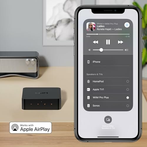 iPhone streaming music to speakers using Apple AirPlay.